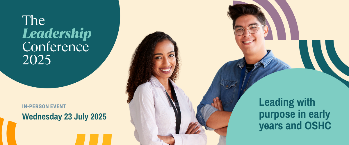 The leadership conference 2025. Two educators looking at the camera and smiling