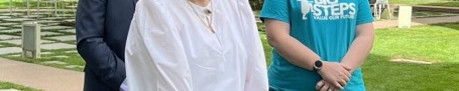 Julie Price, CCC Exec Director speaking outside at Canberra