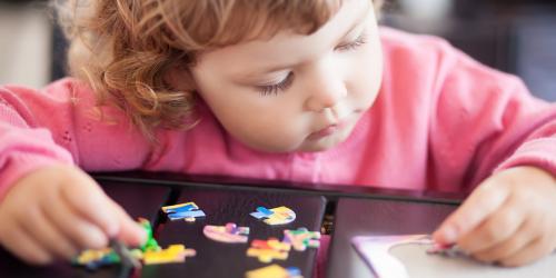 Child working on a puzzle