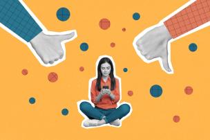 Educator looking at a device with thumbs up and thumbs down in the background