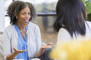 Parent and educator talking 
